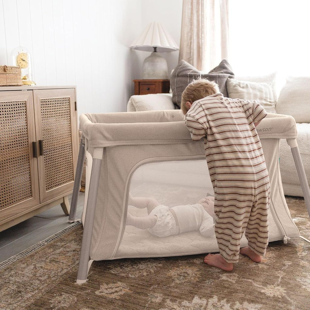 Newton Baby Compact Travel Crib & Play Yard | Breathable & Washable Mattress, Foldable Carry-On Size, Backpack Straps, Sand, Newton Bassinet Attachment NOT Included or Compatible