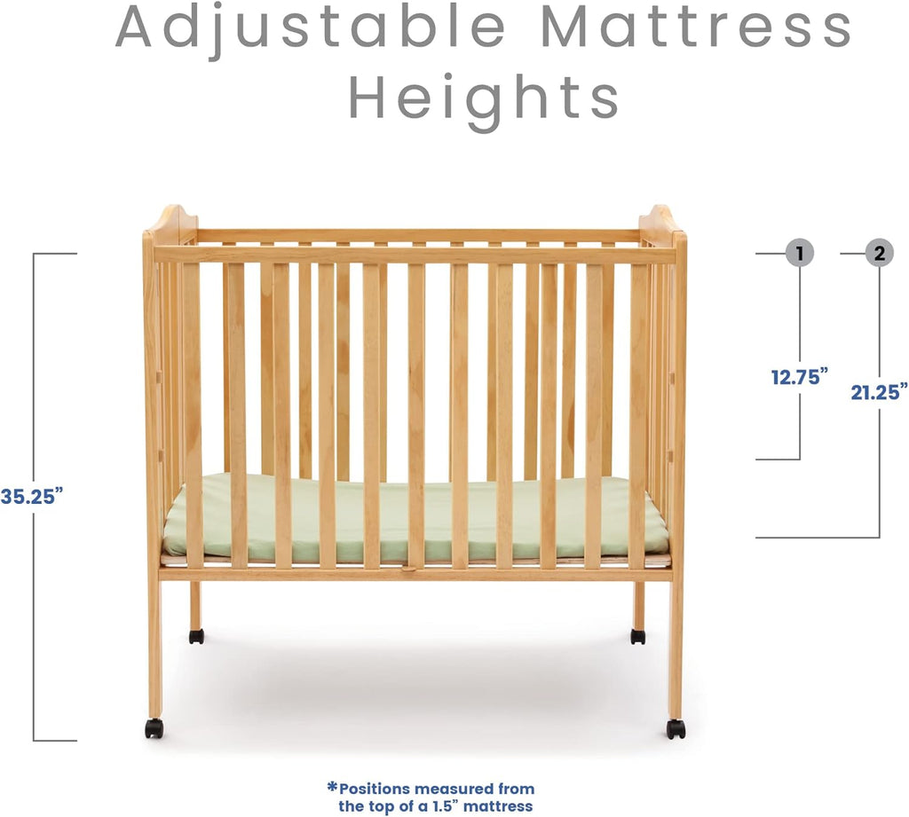 Delta Children Folding Portable Mini Baby Crib with 1.5-inch Mattress - Greenguard Gold Certified, Natural