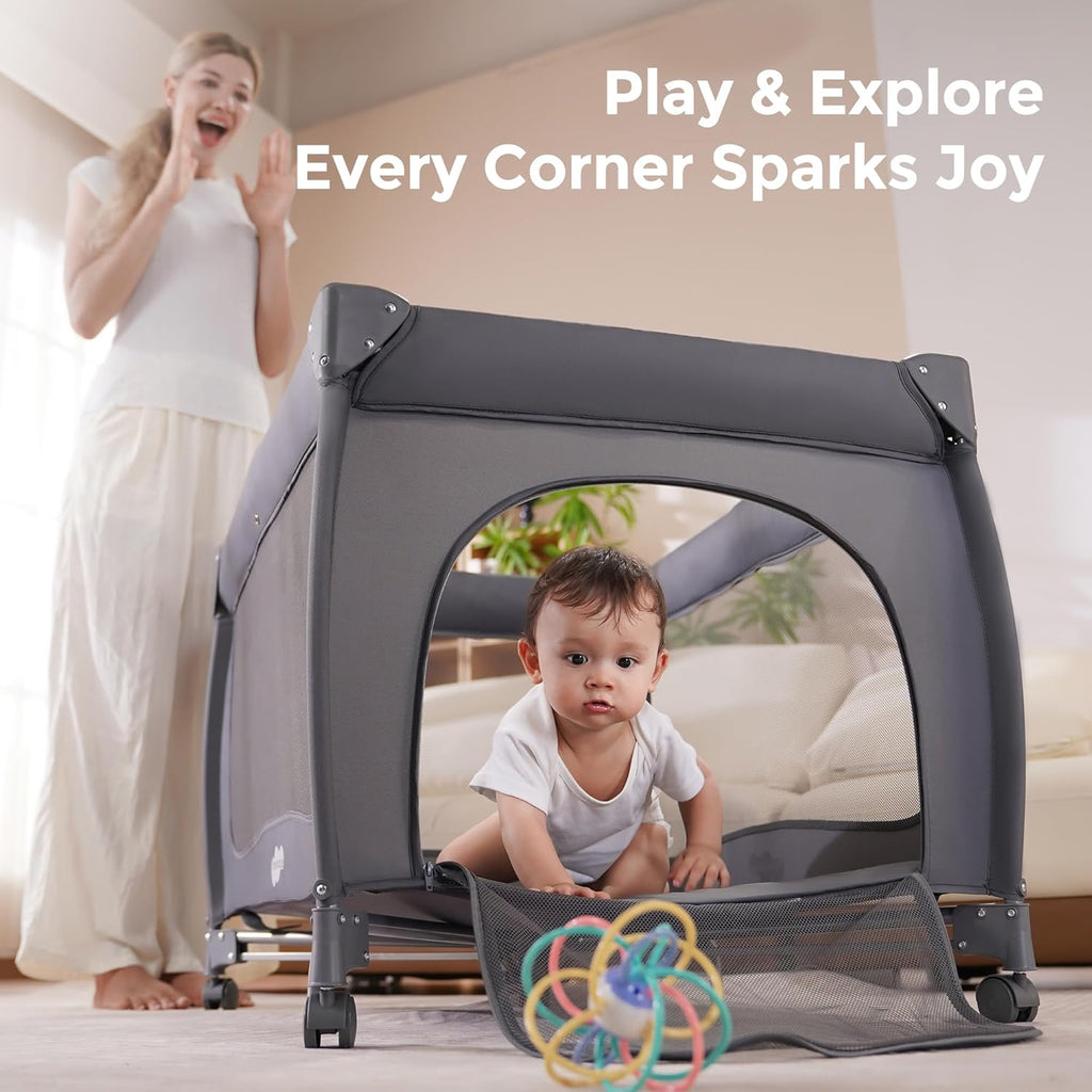 Pamo Babe 7 in 1 Pack and Play with Bassinet, Portable Crib with Mattress, Diaper Changer, Magic Fold™ One-Step Quick Setup Playard, Mosquito Net, Zipper Door, Toy Arch for Newborn to Toddler
