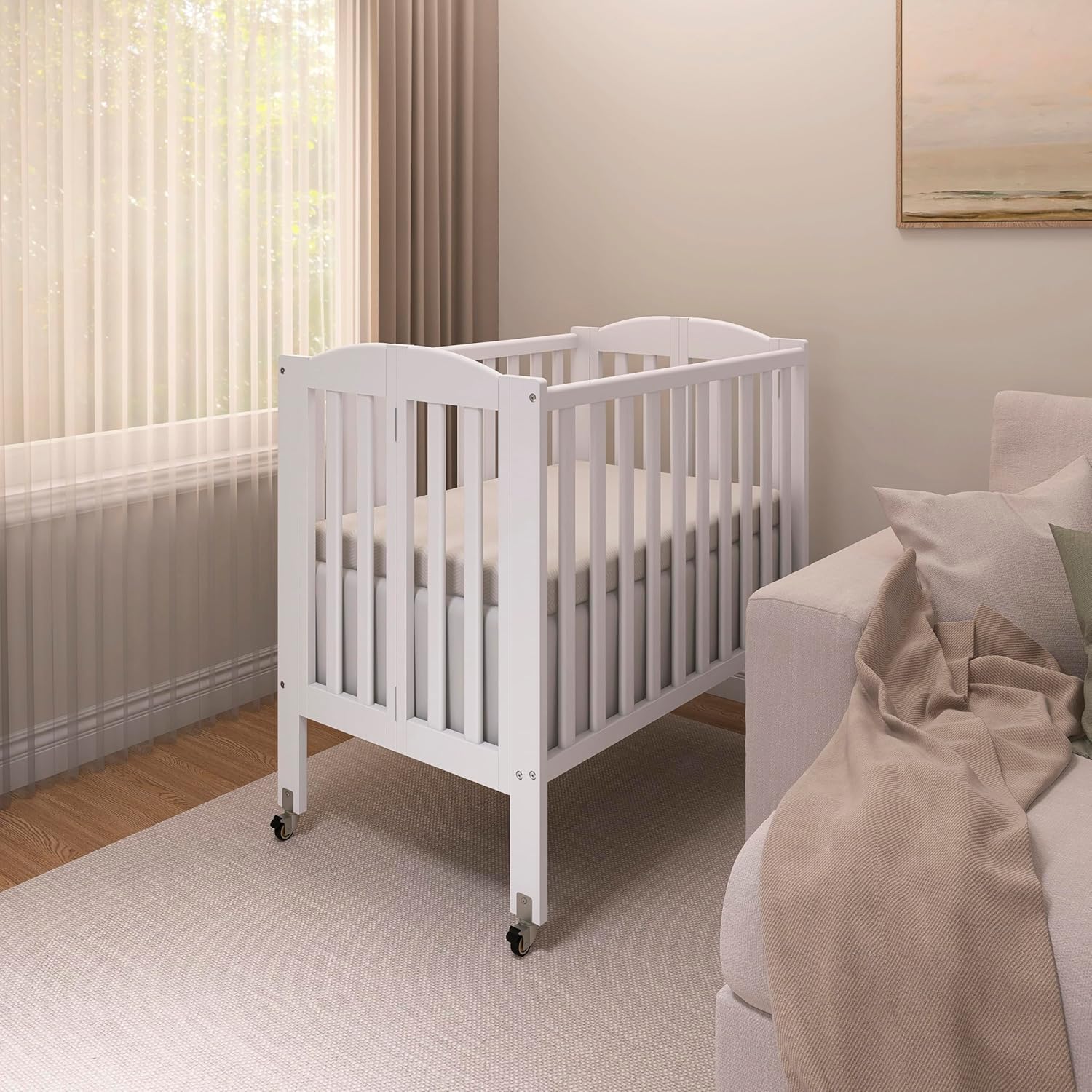 Dream On Me 2-in-1 Portable Mini Crib, Non-Full Size Baby Crib for Small Spaces, 2 Mattress Heights, Compact Travel Design, Includes Mattress, GREENGUARD Gold & BSA Certified, White
