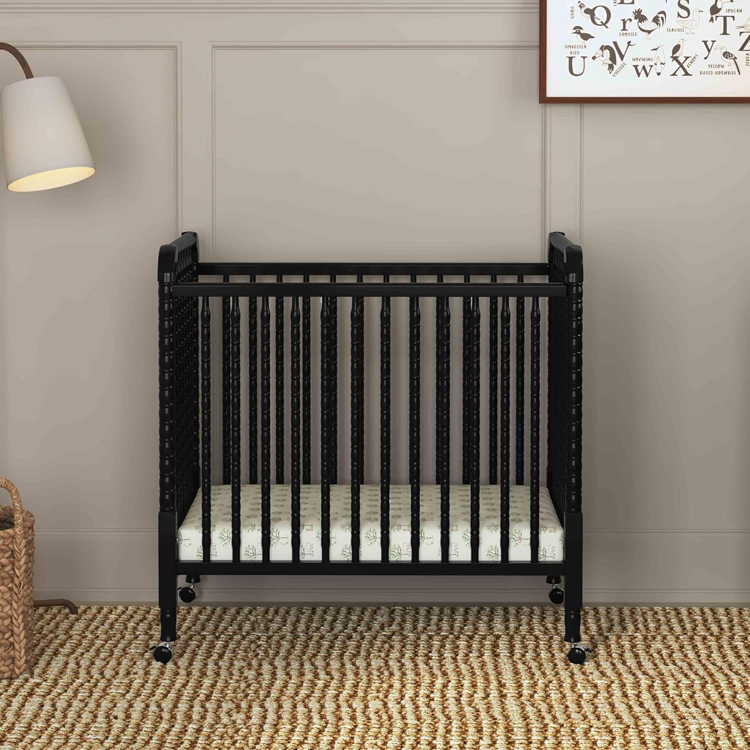 Davinci Jenny Lind 3-in-1 Convertible Mini Crib in Ebony, Removable Wheels, Greenguard Gold Certified