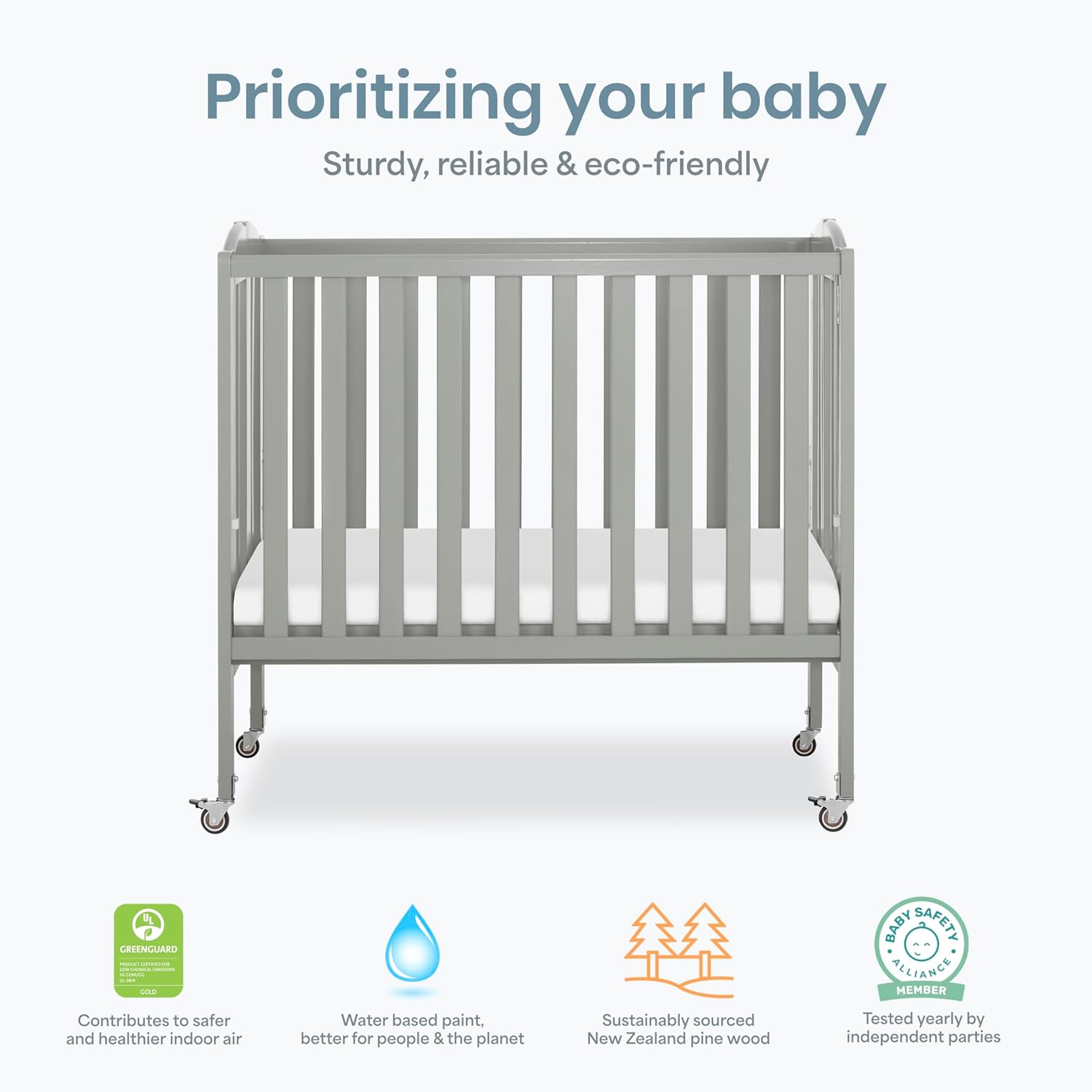 Dream On Me 2-in-1 Portable Mini Crib, Non-Full Size Baby Crib for Small Spaces, 2 Mattress Heights, Compact Travel Design, Includes Mattress, GREENGUARD Gold & BSA Certified, Cool Grey