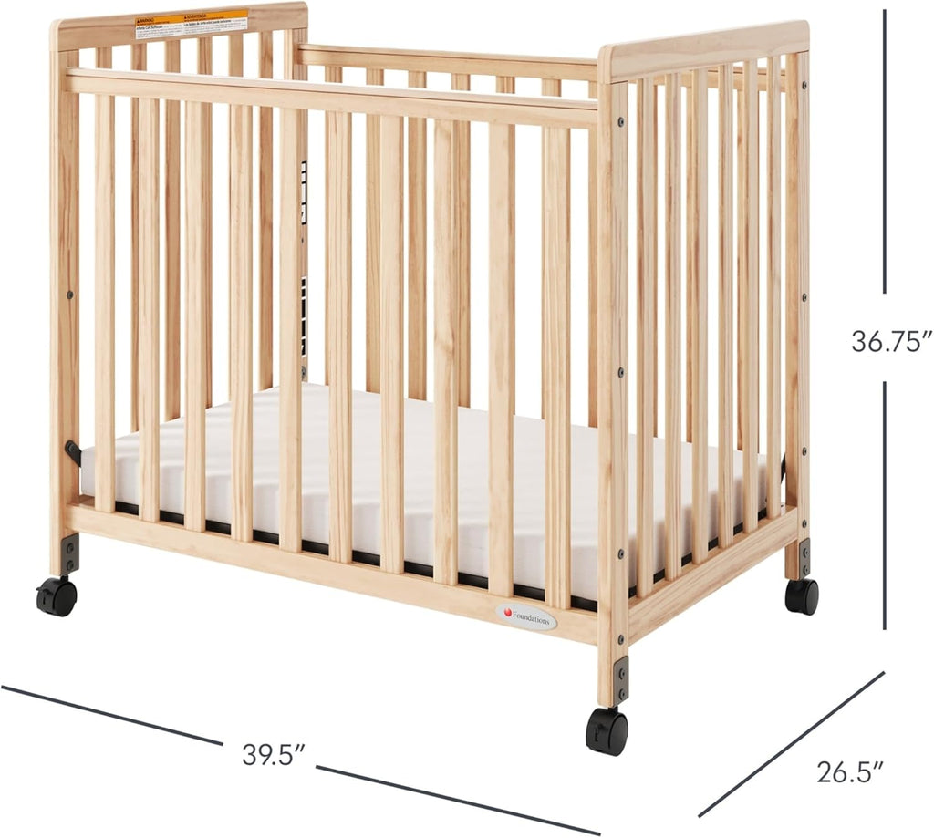 Foundations SafetyCraft Compact Slatted Daycare Crib, Durable Wood Construction, Non-Marking Casters (2 Locking), Includes 3” InfaPure Foam Mattress, Natural