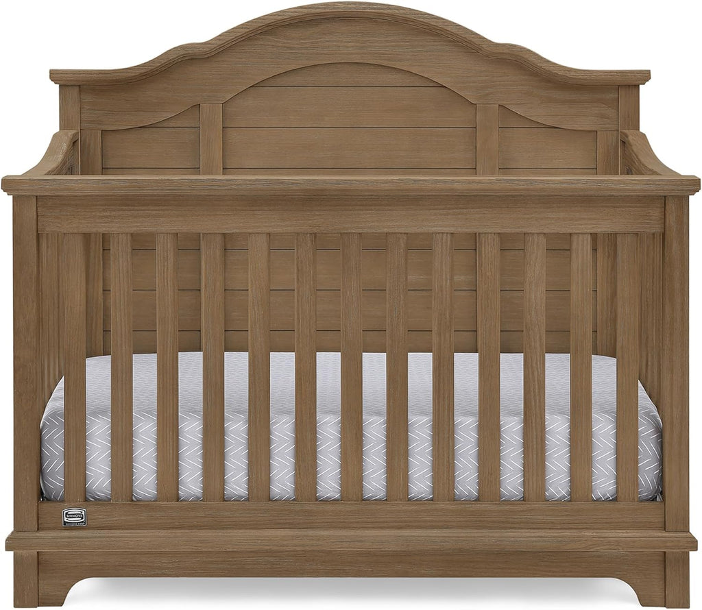 Delta Children Simmons Kids Asher 6-in-1 Convertible Crib with Toddler Rail, Aged Oak