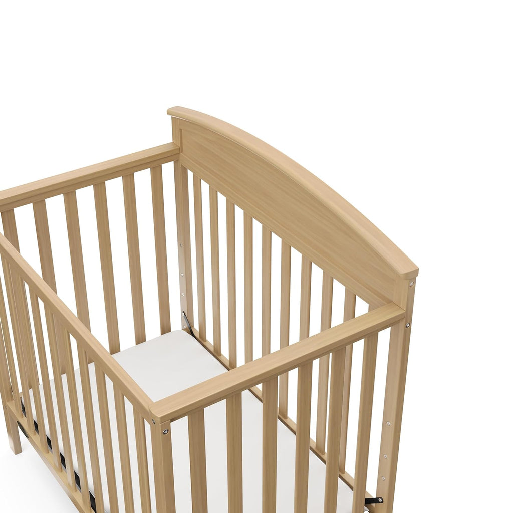 Graco Benton 4-in-1 Convertible Mini Crib with Bonus Crib Mattress – GREENGUARD Gold Certified, 2.75-Inch Mattress Included, Baby Crib Converts to Twin Bed, Ideal for Small Spaces (Driftwood)