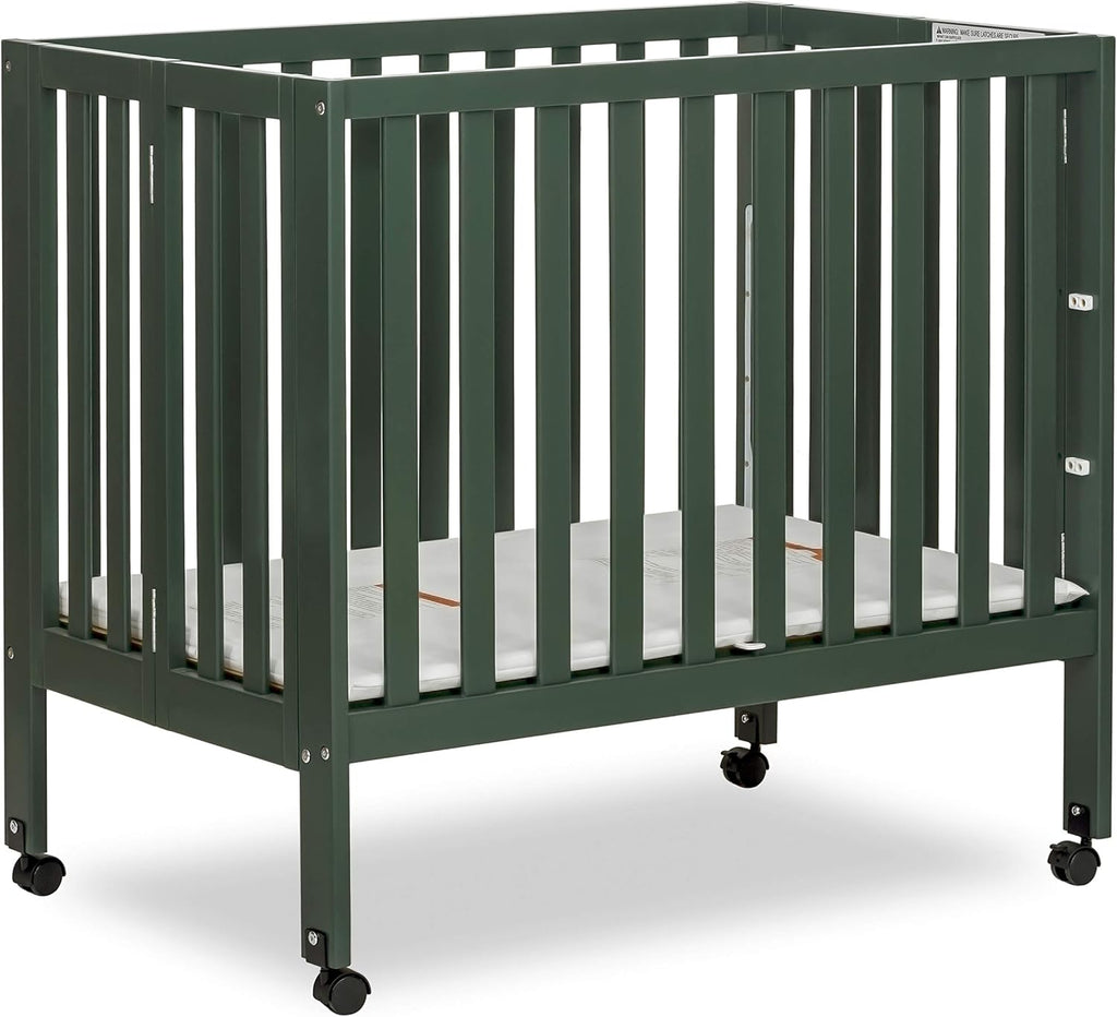 Dream On Me Jett Mini Folding Baby Crib in Olive, GreenGuard Gold & BSA, Lightweight & Portable, Patented Flat Folding System for Small Spaces & Travel, 1.5” Mattress Pad, 3 Heights, Safe Wheels