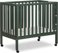 Dream On Me Jett Mini Folding Baby Crib in Olive, GreenGuard Gold & BSA, Lightweight & Portable, Patented Flat Folding System for Small Spaces & Travel, 1.5” Mattress Pad, 3 Heights, Safe Wheels