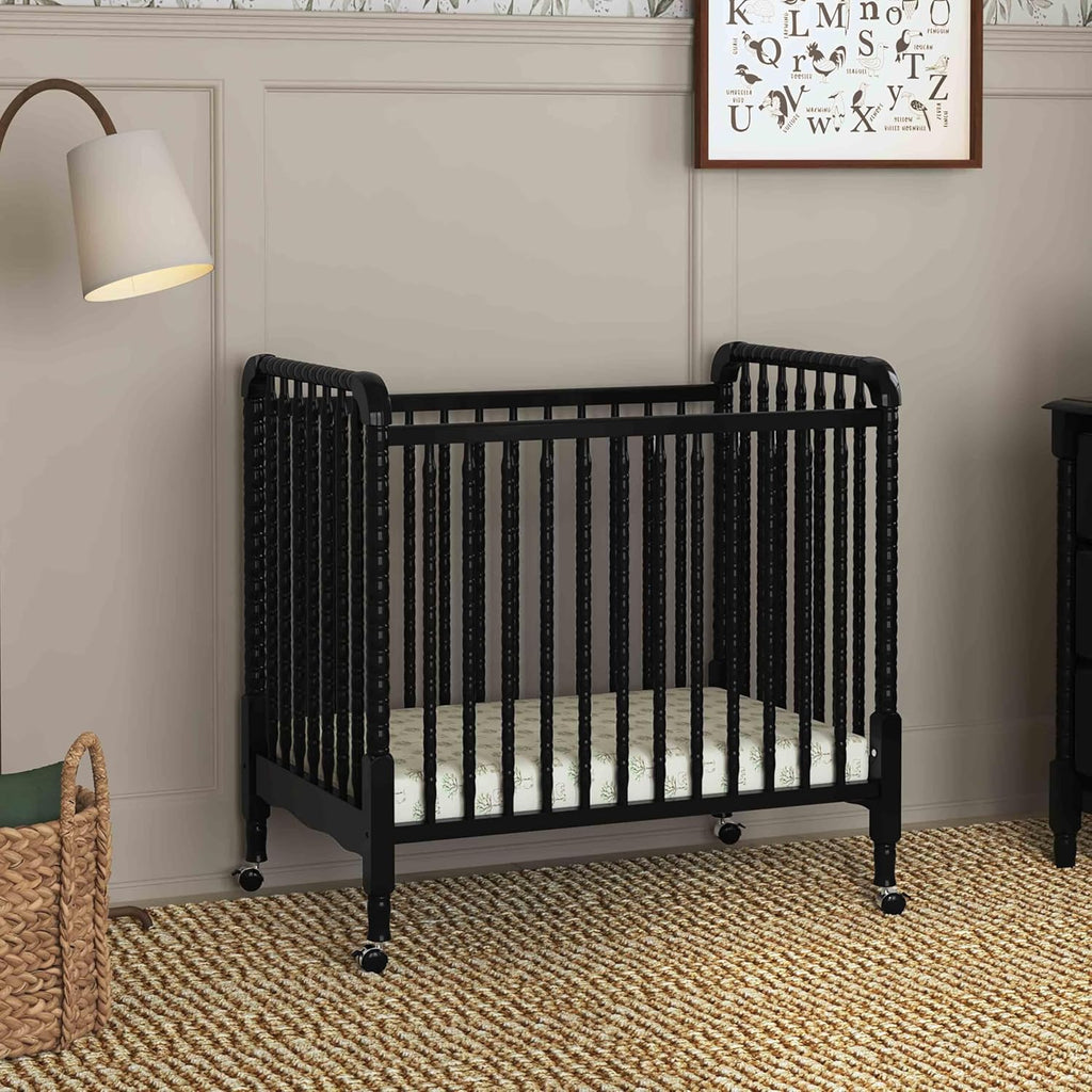 Davinci Jenny Lind 3-in-1 Convertible Mini Crib in Ebony, Removable Wheels, Greenguard Gold Certified