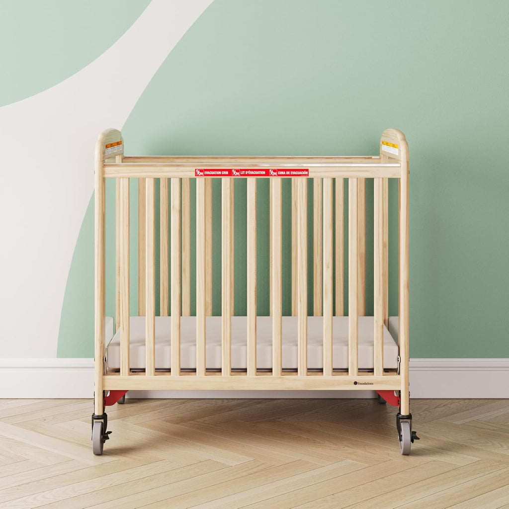 Foundations First Responder Evacuation Fixed-Side Daycare Crib, Features Clearview Panels, Includes Evacuation Frame, 4" Casters, and 3-inch Ultradurable Foam Mattress, Natural